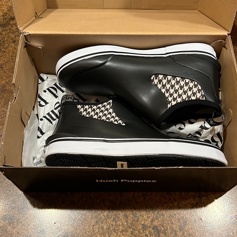 New in box rain sneakers. Hush puppies size 9.
